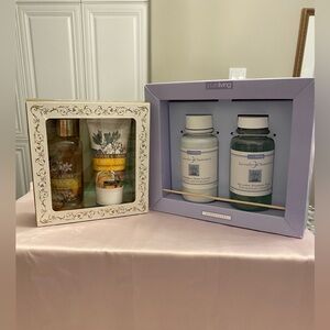 TWO NEW IN BOX SETS OF BODY LOTIONS AND BATH AND SHOWER GELS